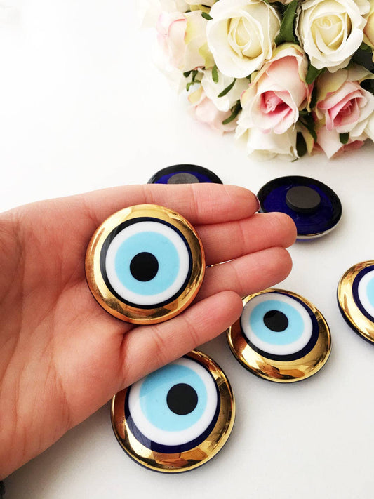 Glass evil eye magnet, gold and silver evil eye charm