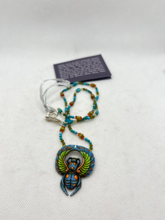 A Scarab Takes Flight Necklace