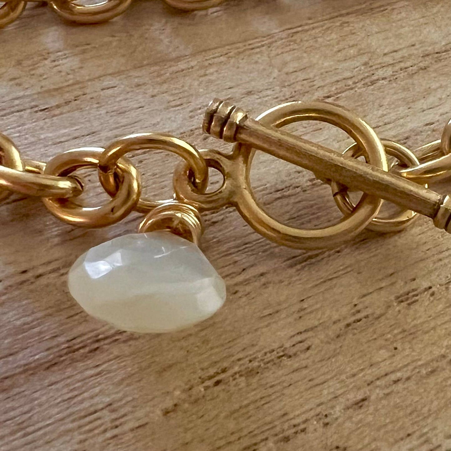 Champagne Thursdays gold traditional charm bracelet