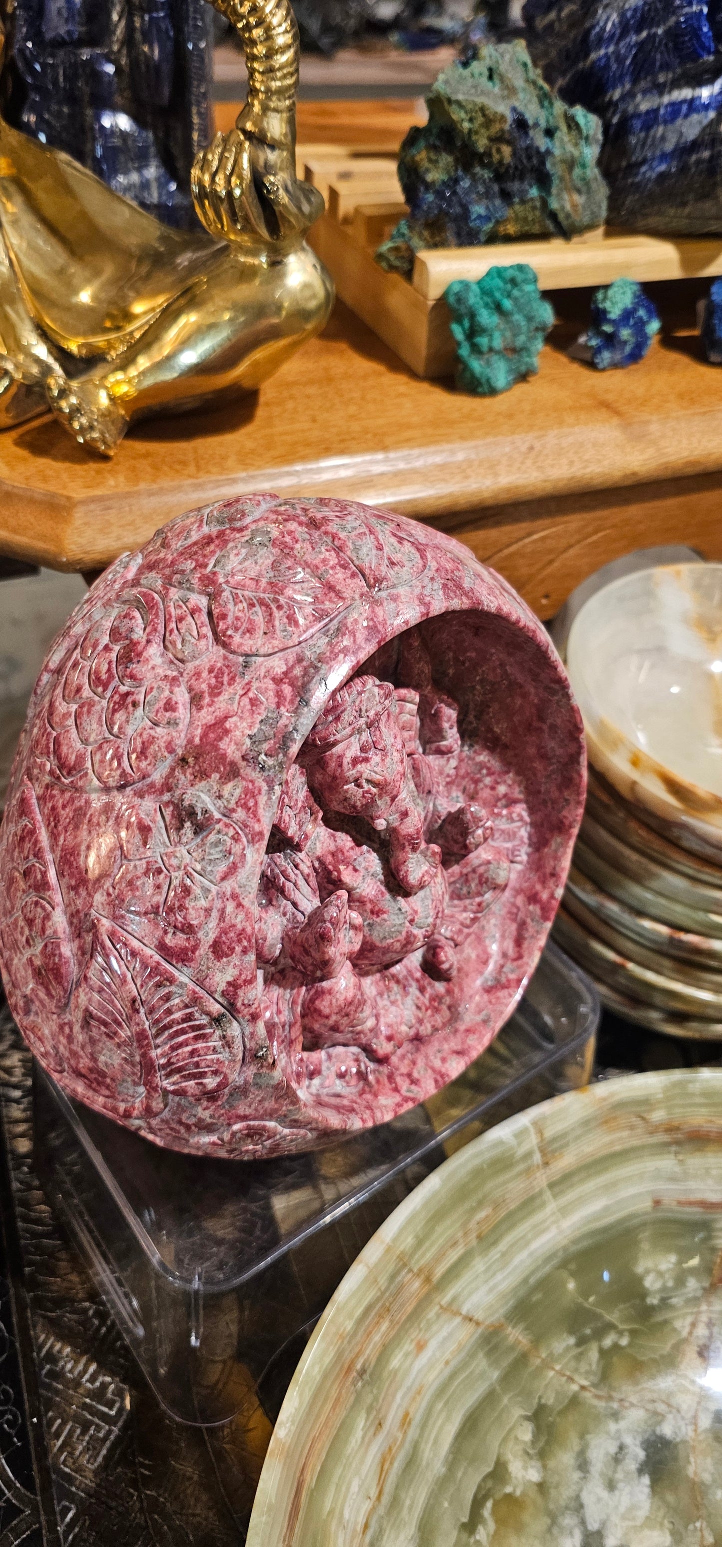 Thulite Ganesha in a cave with Intricate designs and symbols